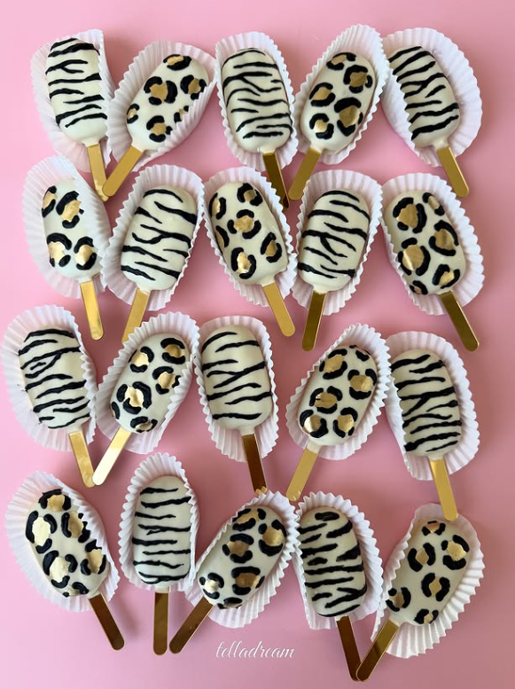 Animal-print decorated cakesickles on sticks